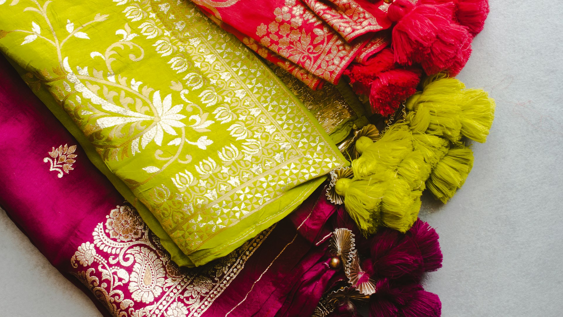 a pile of different types of cloths on a table